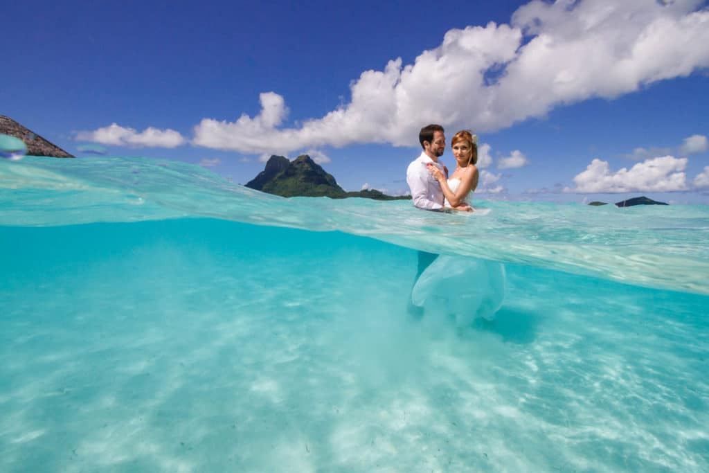 Bride and groom doing a Trash the wedding dress session at the Pearl Beach Resort Bora Bora
