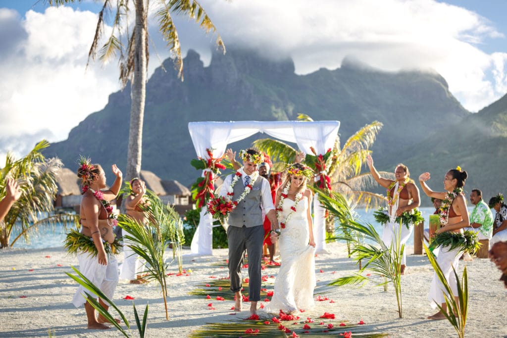 Polynesian ceremony on sunset motu at Four Seasons resort Bora Bora